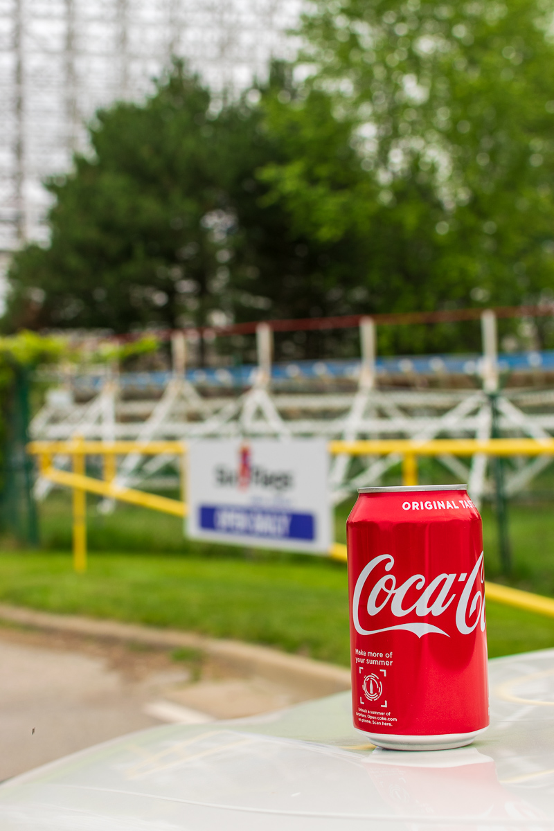 coke can near a roller coaster at six flags